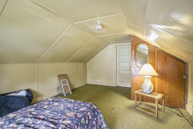 393 Merrill Ave, Muskegon, MI 49441 - carpeted bedroom featuring vaulted ceiling
