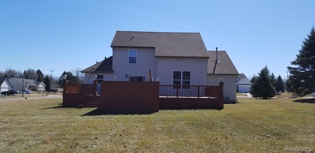 5400 Bright Creek Ct, Flint, MI 48532 - back of house with a deck, a lawn, a shingled roof, and central air condition unit