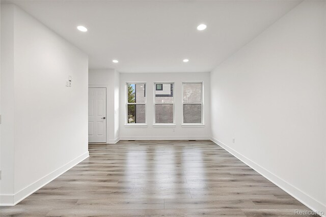 2817 Summers Pl, Troy, MI 48084 - unfurnished room featuring recessed lighting, wood finished floors, and baseboards