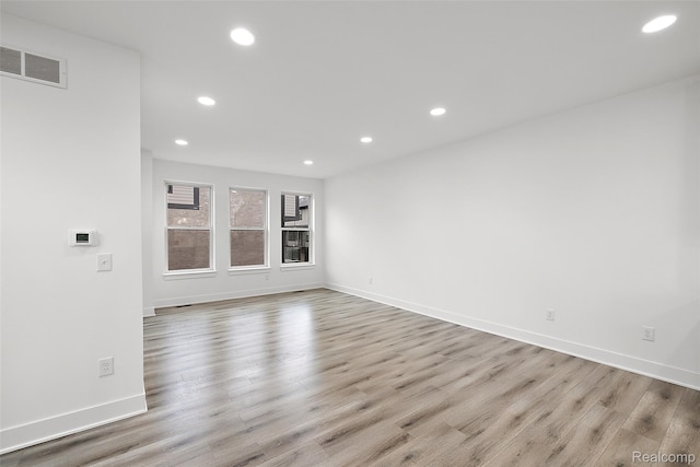 2817 Summers Pl, Troy, MI 48084 - empty room featuring wood finished floors, recessed lighting, and baseboards