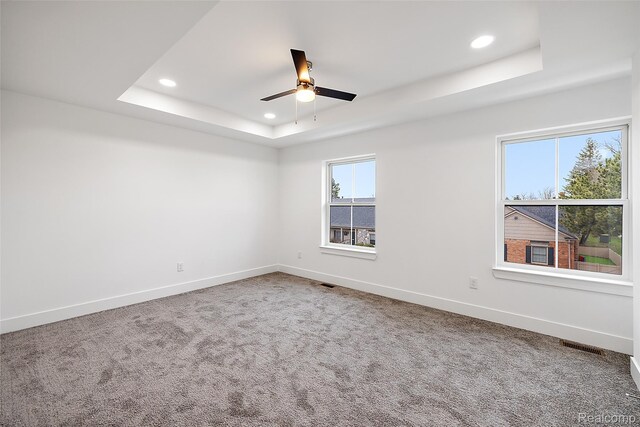 2817 Summers Pl, Troy, MI 48084 - unfurnished room featuring a raised ceiling, recessed lighting, ceiling fan, baseboards, and carpet