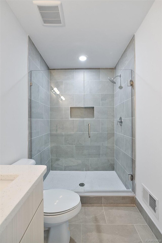 2817 Summers Pl, Troy, MI 48084 - full bathroom with toilet, a shower stall, vanity, tile patterned floors, and recessed lighting