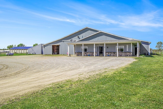 390 Iyopawa Rd, Coldwater, MI 49036 - view of front of home with dirt driveway, a front yard, and covered porch