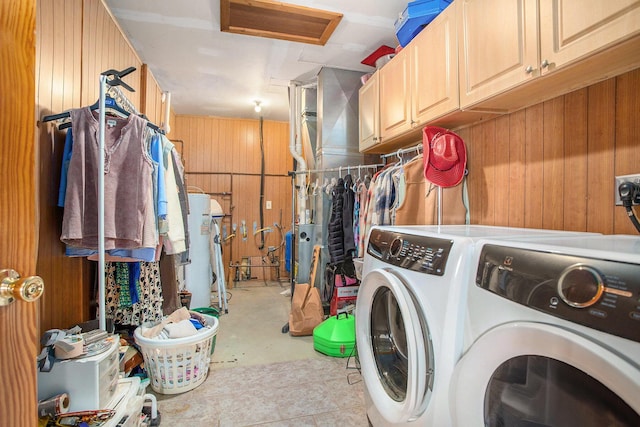 390 Iyopawa Rd, Coldwater, MI 49036 - laundry room with washer and dryer, wood walls, and cabinet space