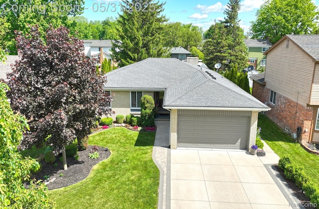 15159 Congress Dr, Sterling Heights, MI 48313 - ranch-style home with brick siding, an attached garage, concrete driveway, a shingled roof, and a front lawn