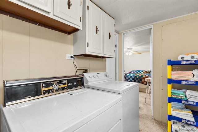 3723 Pinoak St, Clarkston, MI 48348 - laundry room featuring cabinet space, washing machine and clothes dryer, light carpet, and a ceiling fan