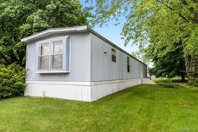 3723 Pinoak St, Clarkston, MI 48348 - view of home's exterior with a lawn