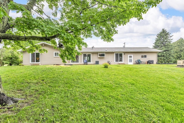 11245 Antcliff Rd, Brooklyn, MI 49230 - back of house featuring a lawn