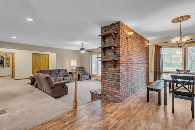 11245 Antcliff Rd, Brooklyn, MI 49230 - living area featuring plenty of natural light, a chandelier, light wood finished floors, baseboards, and recessed lighting