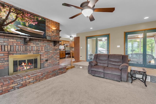 11245 Antcliff Rd, Brooklyn, MI 49230 - living area with carpet, a ceiling fan, a fireplace, and recessed lighting