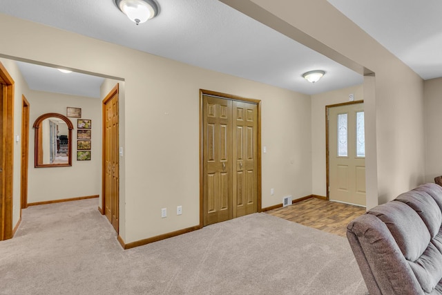 11245 Antcliff Rd, Brooklyn, MI 49230 - entrance foyer featuring carpet floors and baseboards