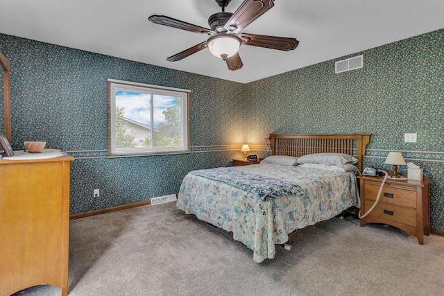 11245 Antcliff Rd, Brooklyn, MI 49230 - carpeted bedroom with wallpapered walls, baseboards, and a ceiling fan