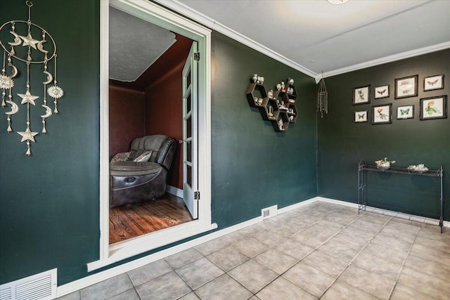 2875 Linco Rd, Berrien Springs, MI 49103 - unfurnished dining area with tile patterned floors, crown molding, and baseboards