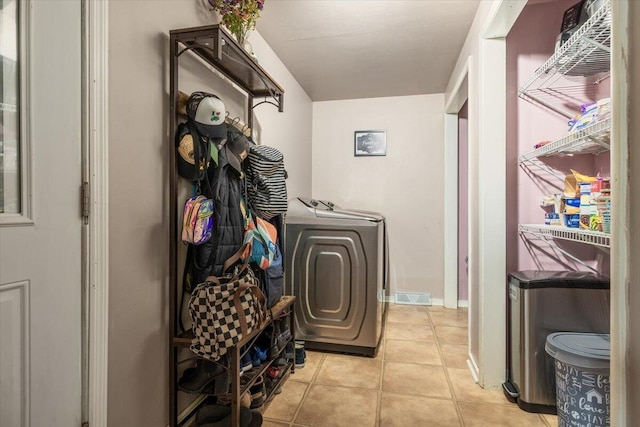 2875 Linco Rd, Berrien Springs, MI 49103 - washroom featuring light tile patterned floors and washer / clothes dryer