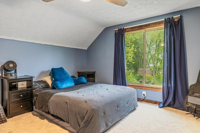 2875 Linco Rd, Berrien Springs, MI 49103 - bedroom featuring carpet flooring, vaulted ceiling, a textured ceiling, and ceiling fan