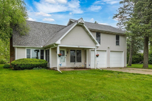 2875 Linco Rd, Berrien Springs, MI 49103 - view of front of home with an attached garage, concrete driveway, a front lawn, and a shingled roof