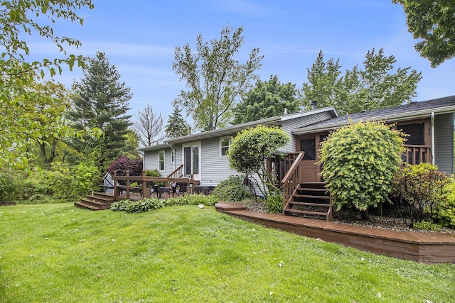 7289 Eagle Ter, Michigan, MI 49071 - back of property featuring a deck and a lawn
