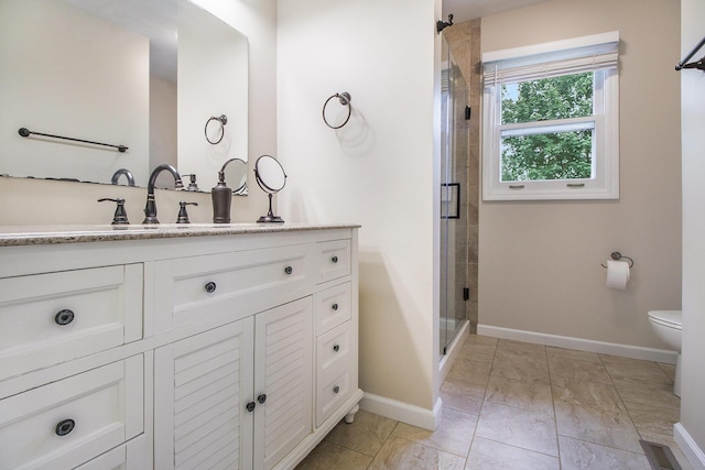 7289 Eagle Ter, Michigan, MI 49071 - full bath with vanity, a shower stall, toilet, and baseboards