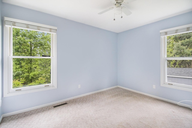 7289 Eagle Ter, Michigan, MI 49071 - empty room featuring carpet, baseboards, and ceiling fan