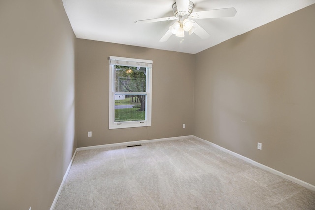 7289 Eagle Ter, Michigan, MI 49071 - empty room featuring light carpet, baseboards, and ceiling fan