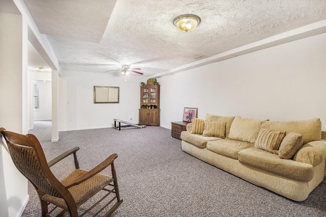 7289 Eagle Ter, Michigan, MI 49071 - living area with carpet floors, ceiling fan, a textured ceiling, and baseboards