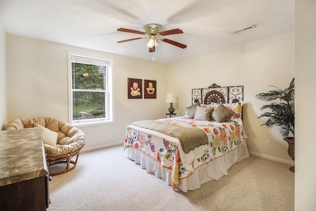 7289 Eagle Ter, Michigan, MI 49071 - bedroom featuring light colored carpet, baseboards, and a ceiling fan