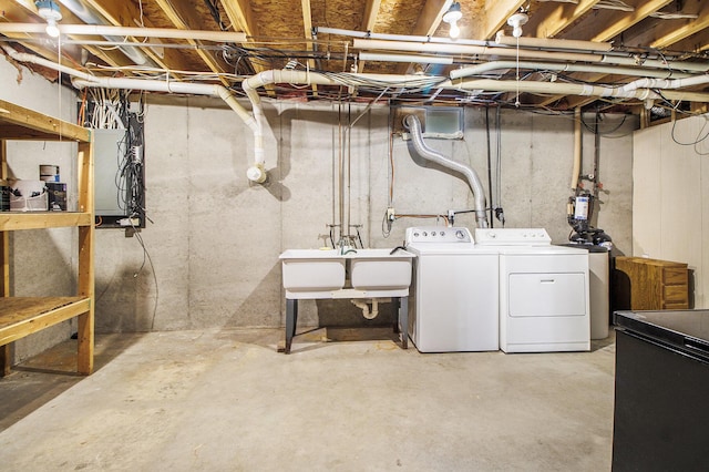 7289 Eagle Ter, Michigan, MI 49071 - unfinished basement with washer and clothes dryer and a sink