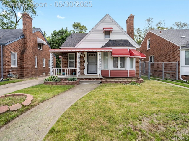 15058 Vaughan St, Detroit, MI 48223 - bungalow-style home featuring covered porch, brick siding, and a chimney