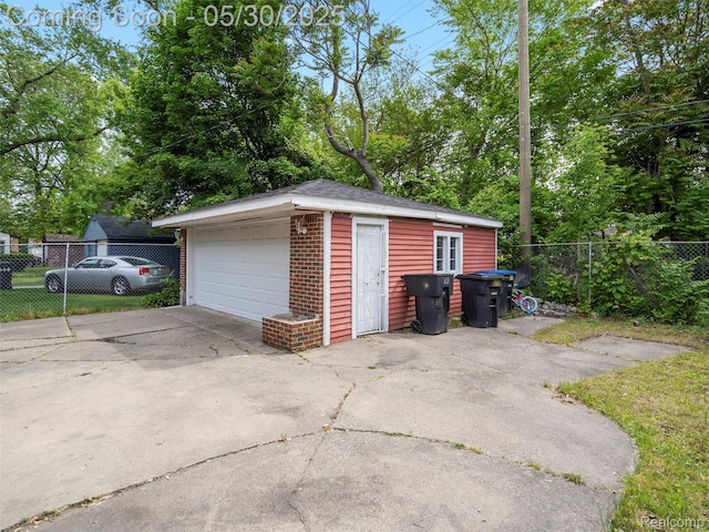 15058 Vaughan St, Detroit, MI 48223 - detached garage featuring view of scattered trees