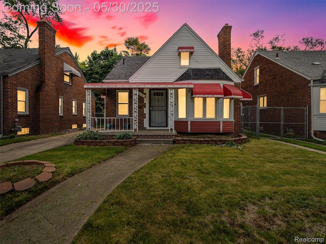 15058 Vaughan St, Detroit, MI 48223 - bungalow-style home featuring covered porch, a chimney, brick siding, and a shingled roof