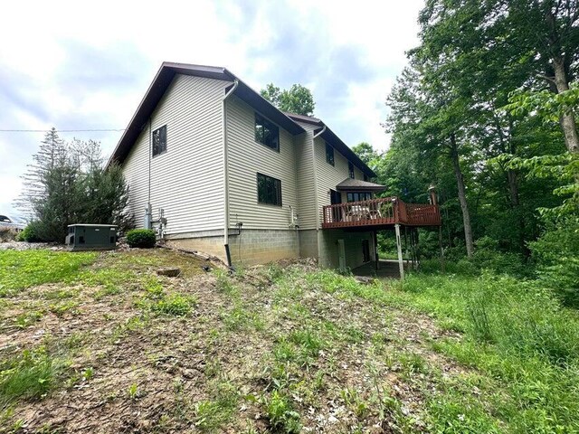 1720 Dimmers Rd, Reading, MI 49274 - view of side of property featuring a deck