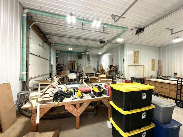 1720 Dimmers Rd, Reading, MI 49274 - garage with a workshop area