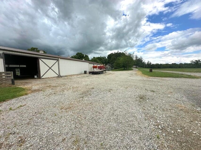 1720 Dimmers Rd, Reading, MI 49274 - view of dirt / gravel driveway with an outbuilding
