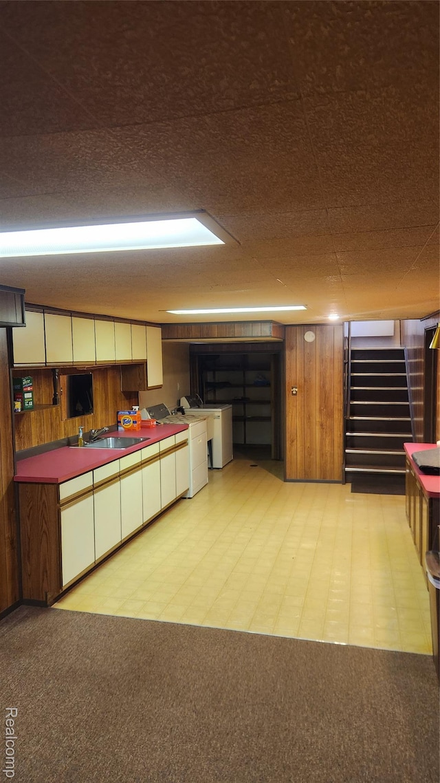 34245 Shawnee St, Westland, MI 48185 - kitchen with independent washer and dryer, a sink, and light floors