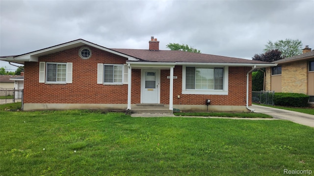 34245 Shawnee St, Westland, MI 48185 - bungalow-style home with a chimney and brick siding