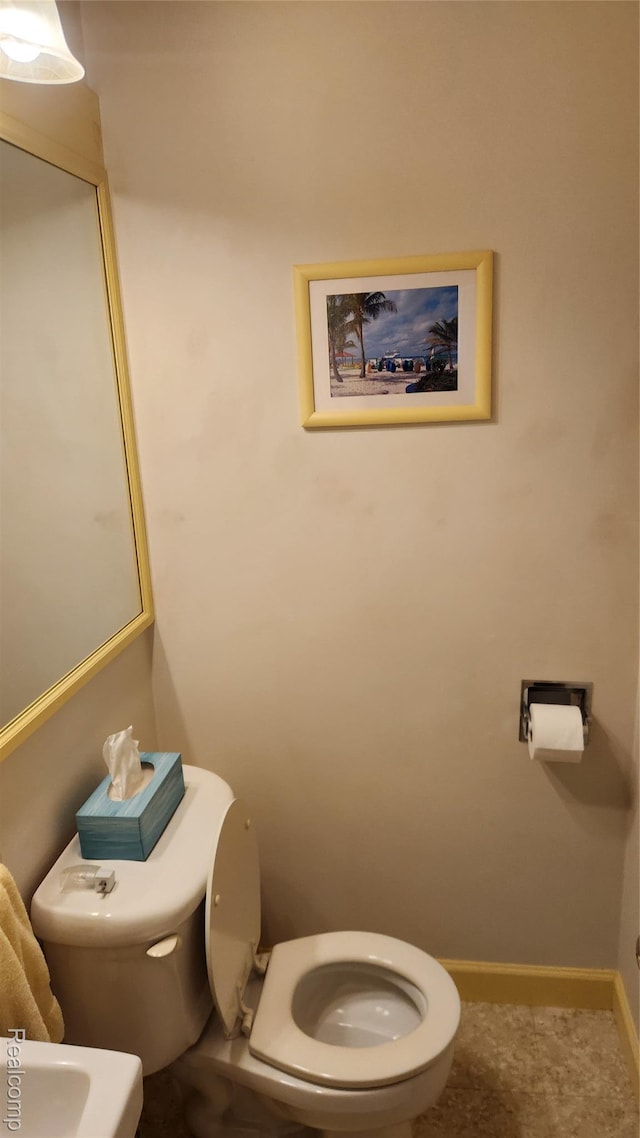 34245 Shawnee St, Westland, MI 48185 - half bathroom featuring toilet and baseboards