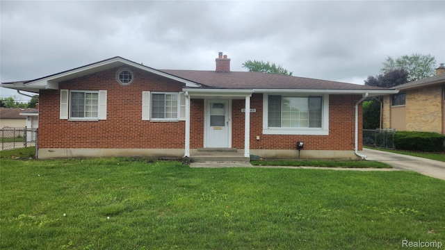 34245 Shawnee St, Westland, MI 48185 - bungalow-style house with a chimney and brick siding