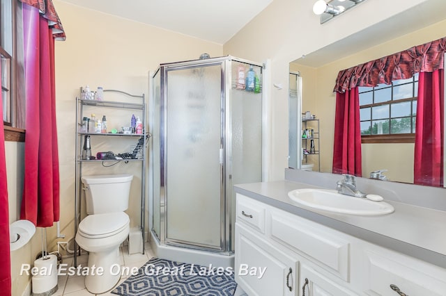 2203 Bullock Rd, Lapeer, MI 48446 - bathroom with a stall shower, toilet, tile patterned floors, and vanity