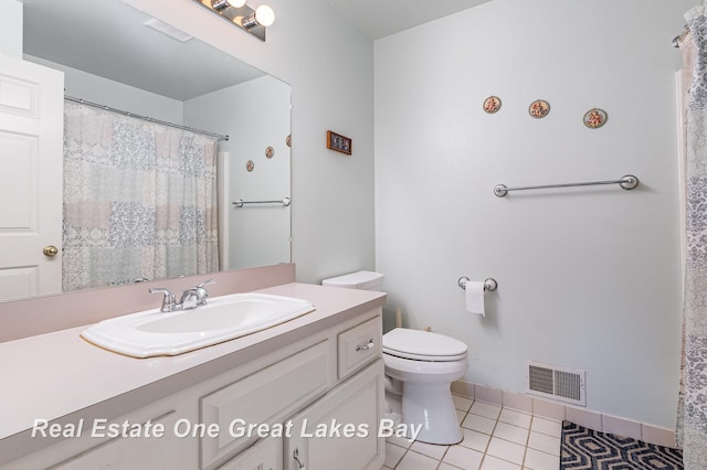 2203 Bullock Rd, Lapeer, MI 48446 - full bathroom featuring tile patterned floors, vanity, and toilet