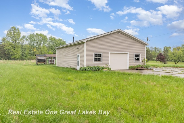 2203 Bullock Rd, Lapeer, MI 48446 - view of side of home with an outdoor structure