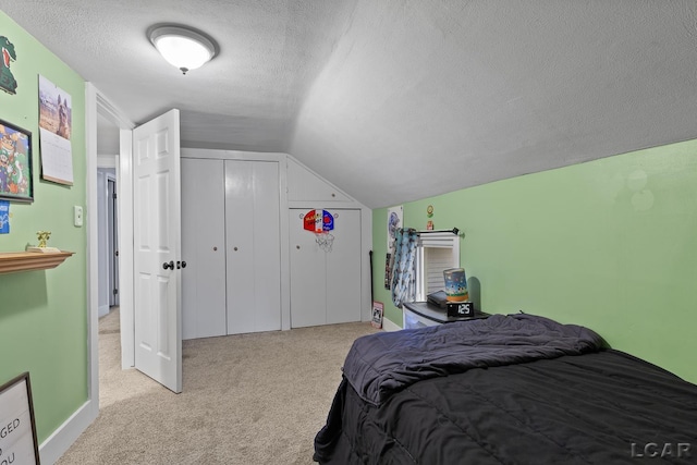 2803 Spielman Rd, Adrian, MI 49221 - bedroom with lofted ceiling, light colored carpet, a textured ceiling, and baseboards