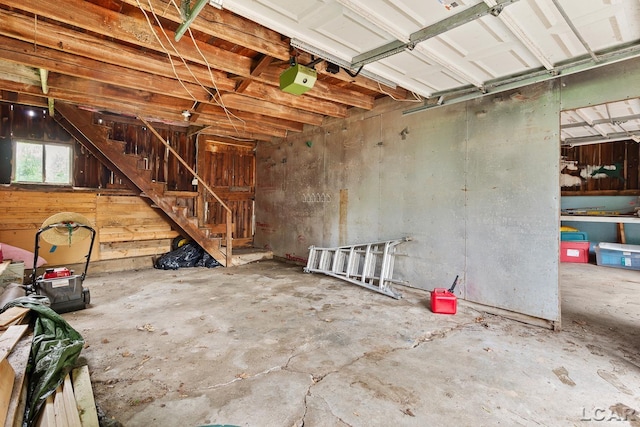 2803 Spielman Rd, Adrian, MI 49221 - garage featuring a garage door opener