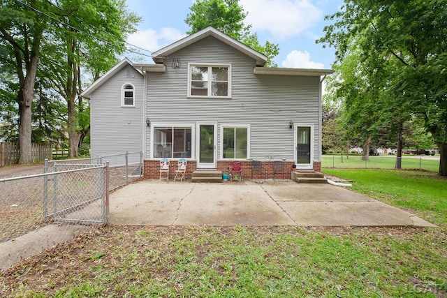 2803 Spielman Rd, Adrian, MI 49221 - back of house with entry steps, a gate, and a patio area