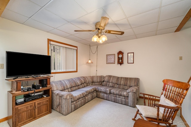 5295 E 14th St, Au Gres, MI 48703 - living room with a drop ceiling, ceiling fan, carpet, and baseboards