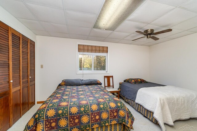 5295 E 14th St, Au Gres, MI 48703 - bedroom with carpet floors, a drop ceiling, ceiling fan, and a closet