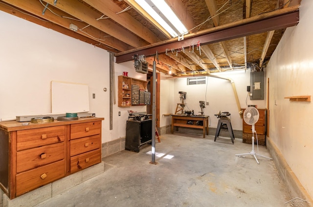 5295 E 14th St, Au Gres, MI 48703 - unfinished below grade area with electric panel and a workshop area