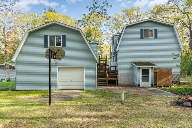 5295 E 14th St, Au Gres, MI 48703 - rear view of property with a gambrel roof and a deck