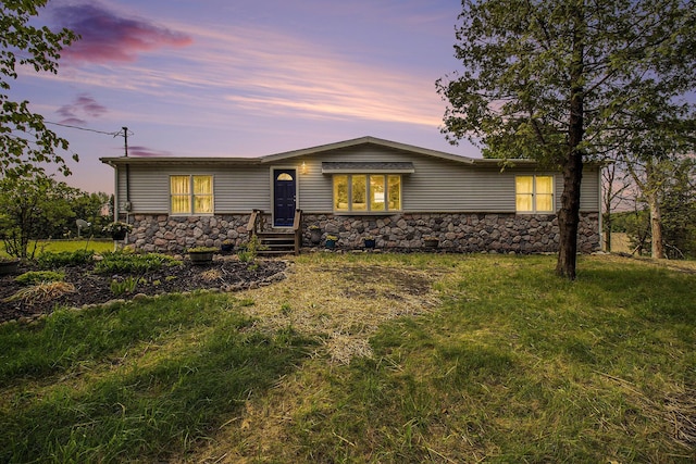1981 E Wolf Rd, Hart, MI 49420 - view of front of house featuring stone siding