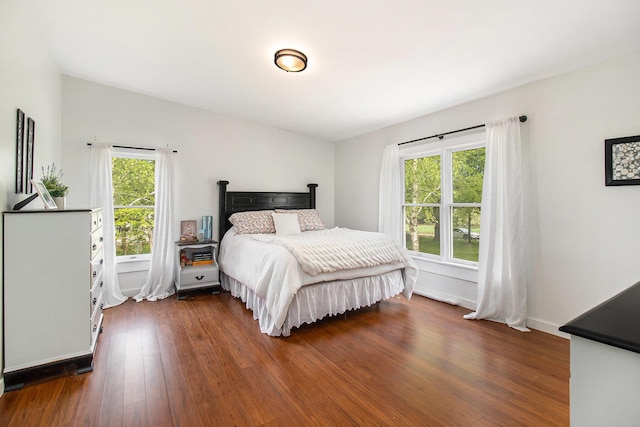 1981 E Wolf Rd, Hart, MI 49420 - bedroom featuring dark wood-style floors and vaulted ceiling