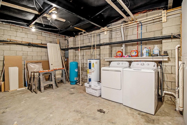 1981 E Wolf Rd, Hart, MI 49420 - unfinished below grade area with electric water heater, washing machine and dryer, a water pressure tank, and concrete block wall